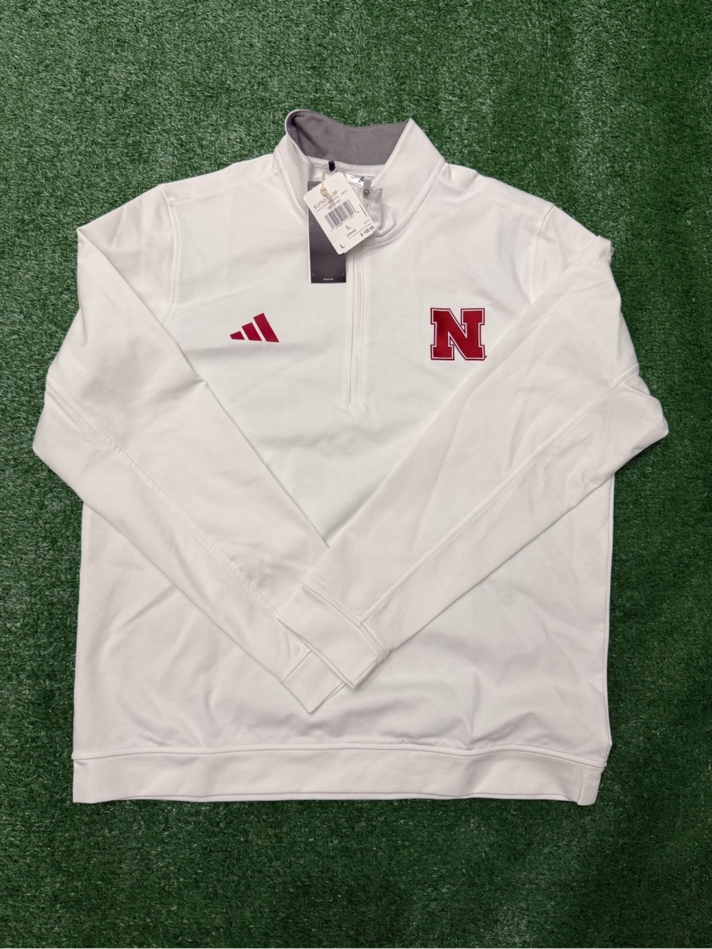 ADIDAS NEBRASKA CORNHUSKERS MEN’S ELEVATED LONG SLEEVE 1/4 ZIP PULLOVER – WHITE